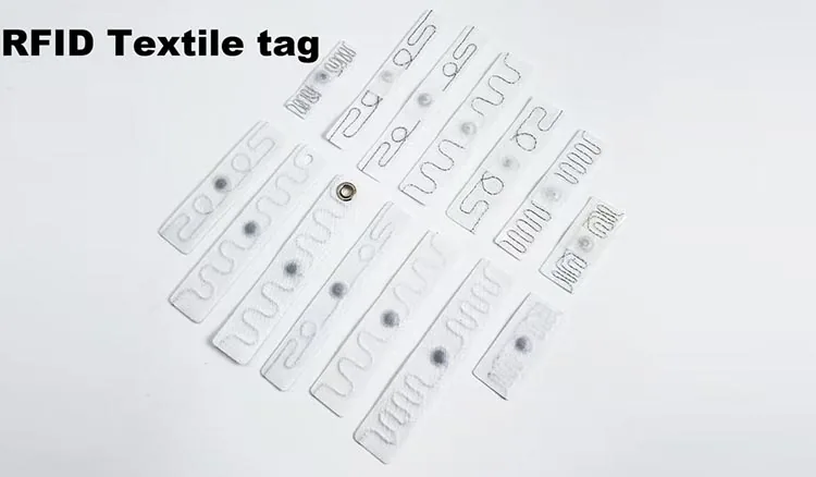 RFID textile laundry tags - woven washable label strips with meander antenna and chip module